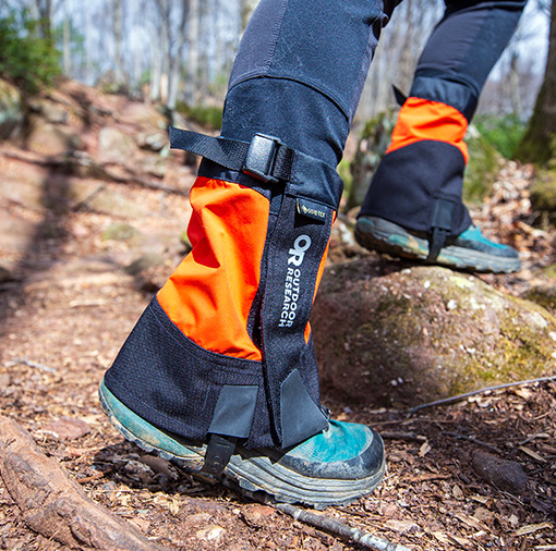 Closeup of person wearing gaiters outdoors