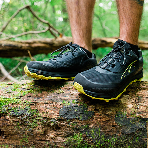 Man wearing trail running shoes outdoors
